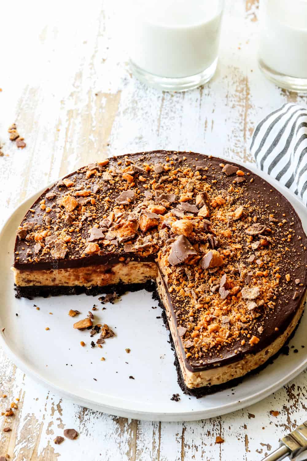 Butterfinger Pie with two slices take out of it