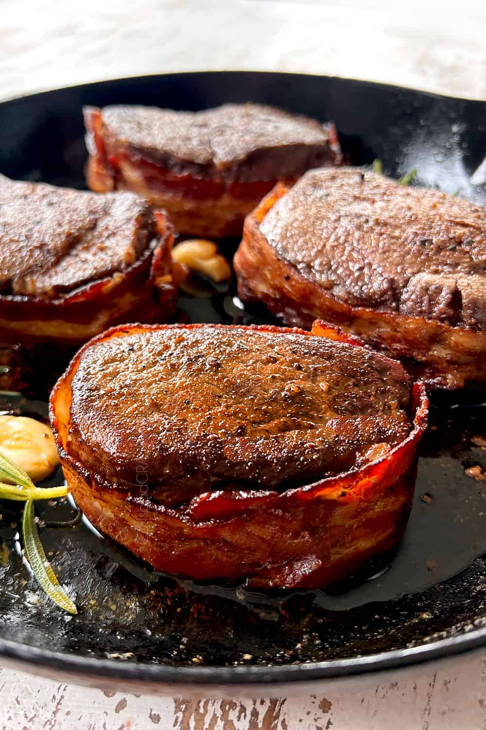 up close of filet mignon recipe in a cast iron skillet