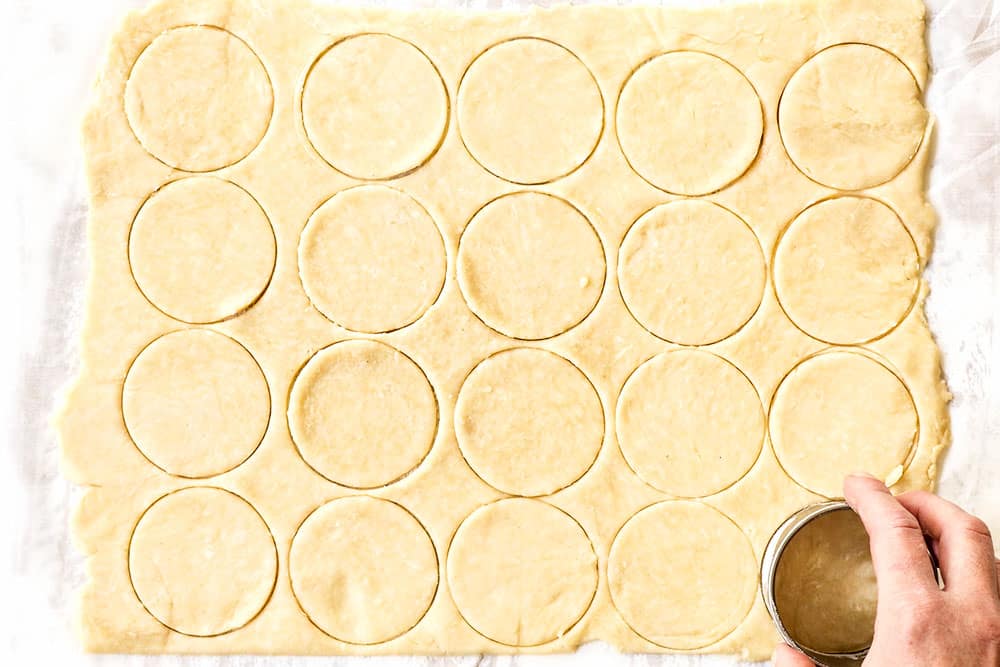 showing how to make mini quiche recipe by cutting rounds into the pastry dough