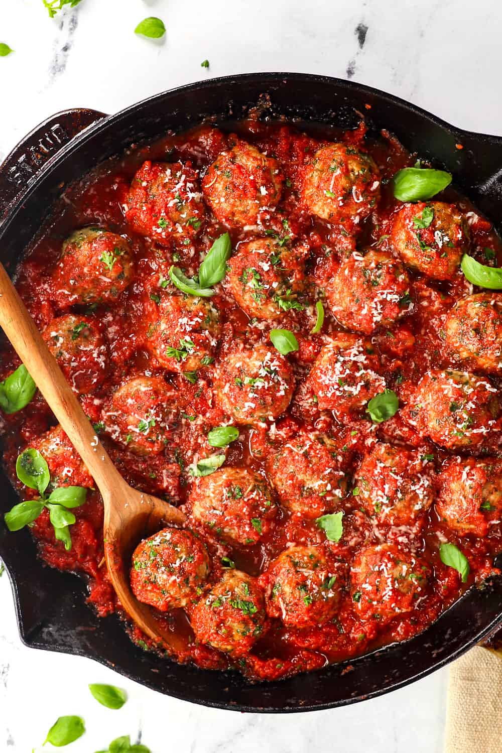 showing ways to serve Italian turkey meatballs by serving with marinara sauce in a skillet