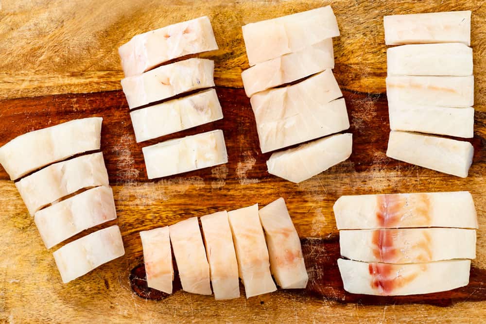 showing how to make fish sticks by slicing cod fillets into strips