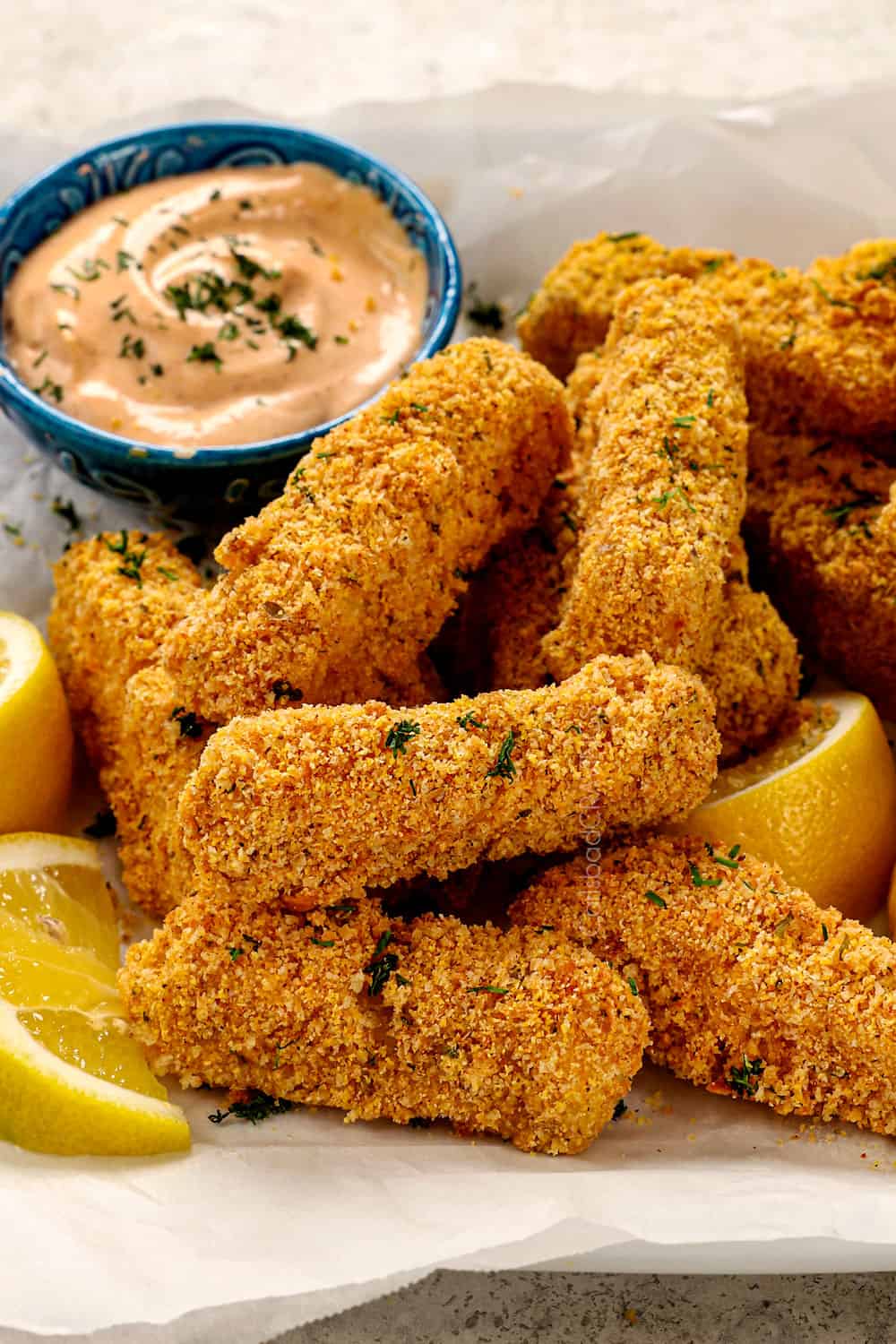 up close of air fryer or baked fish sticks showing how crispy they are