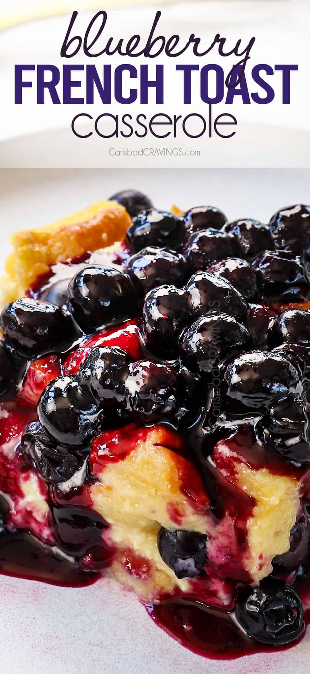 up close of a slice of French toast casserole with blueberry sauce