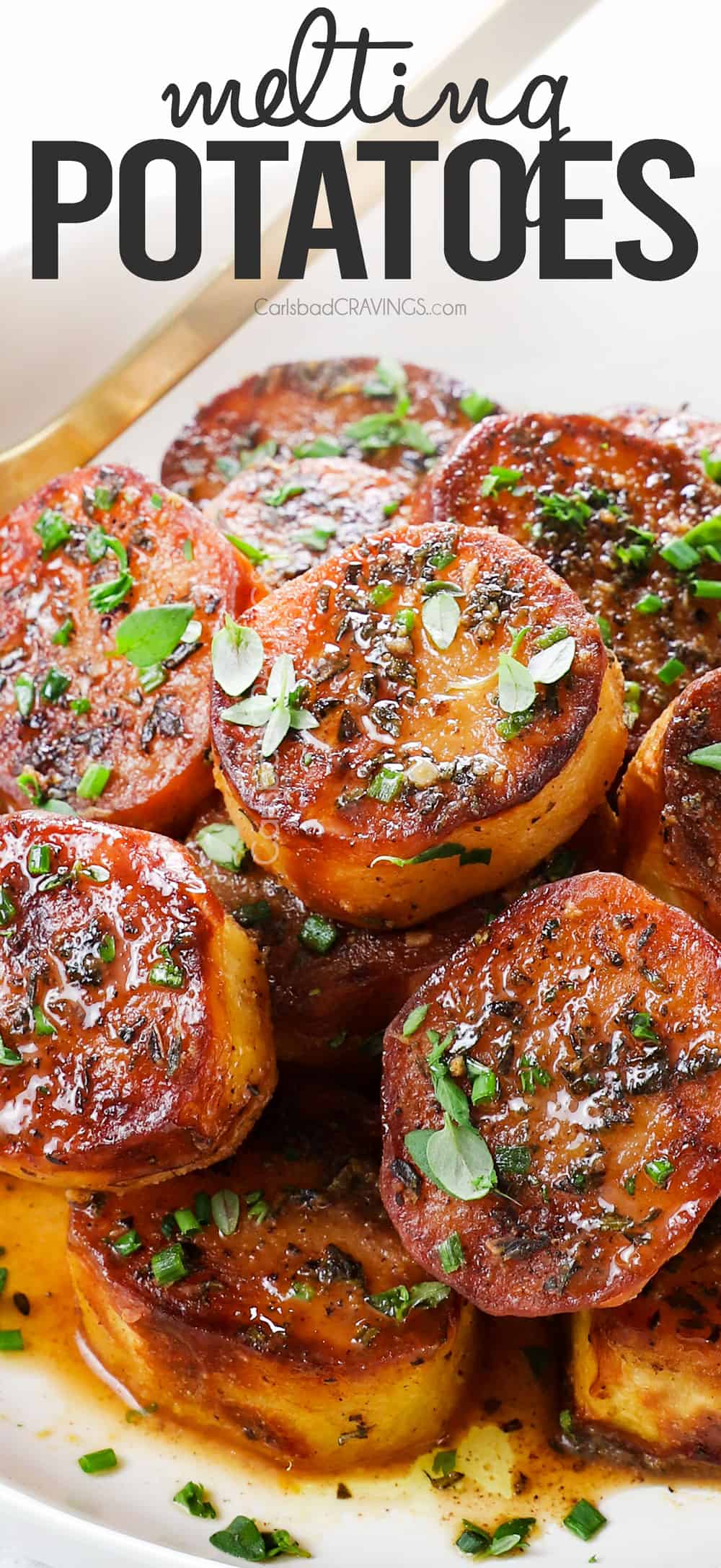 a bowl of melting butter potatoes garnished by fresh thyme