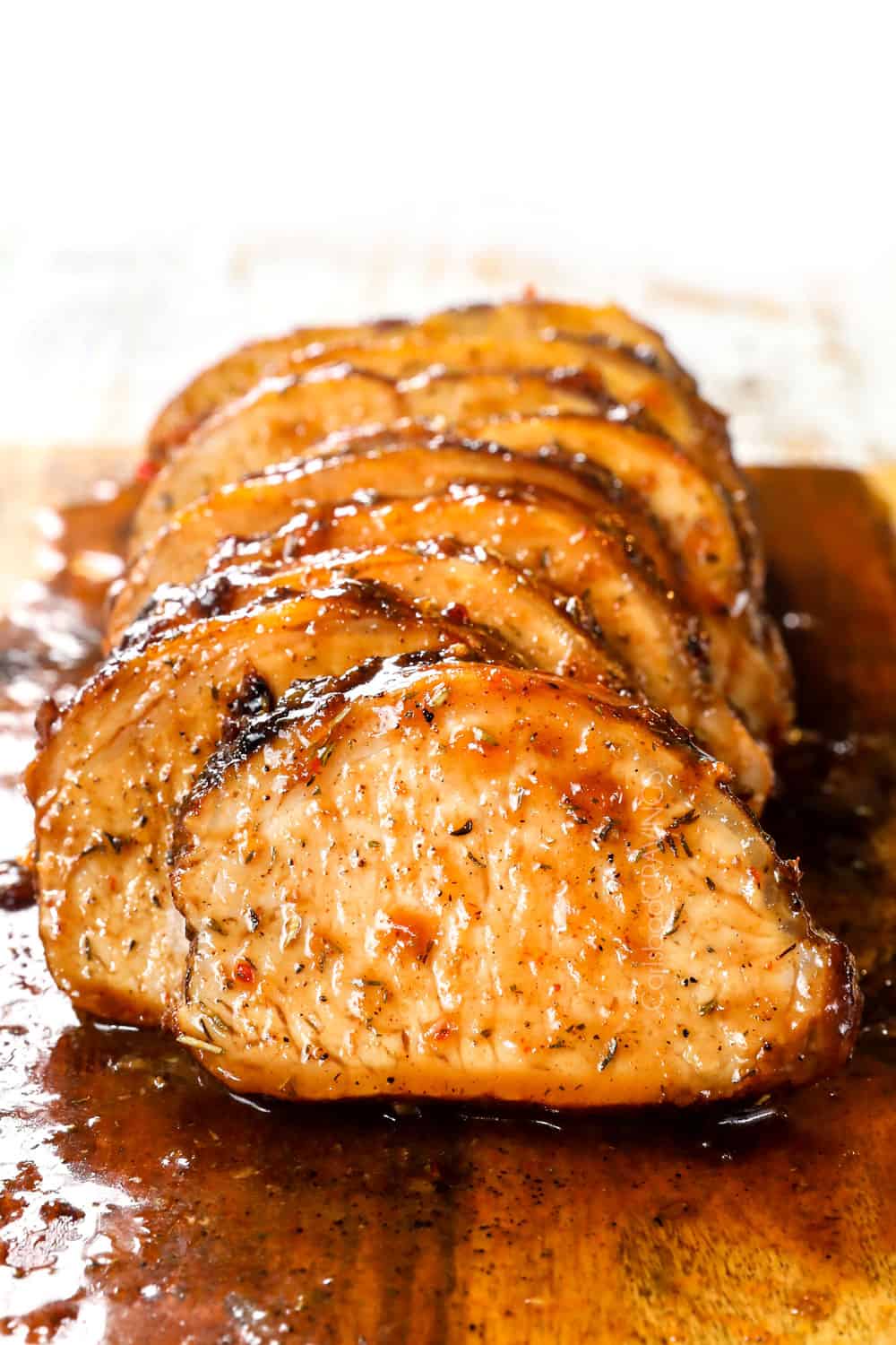 up close of pork loin roast recipe showing how juicy the pork is