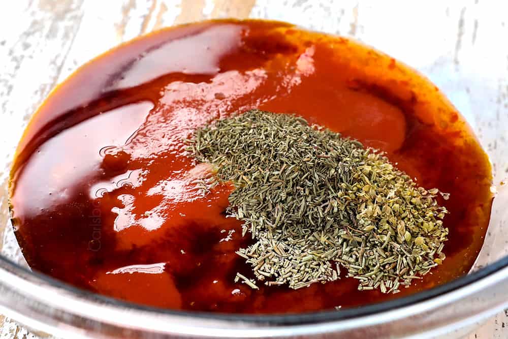 showing how to make pork loin roast by adding apricot preserves, soy sauce, balsamic and herbs to a bowl