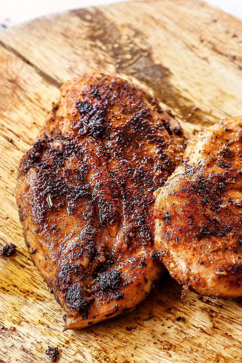 showing how to make Caesar Pasta Salad by cooking chicken until deeply golden