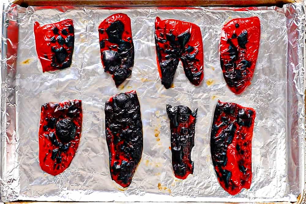 showing how to make peri peri chicken by making peri peri sauce by broiling the red bell peppers