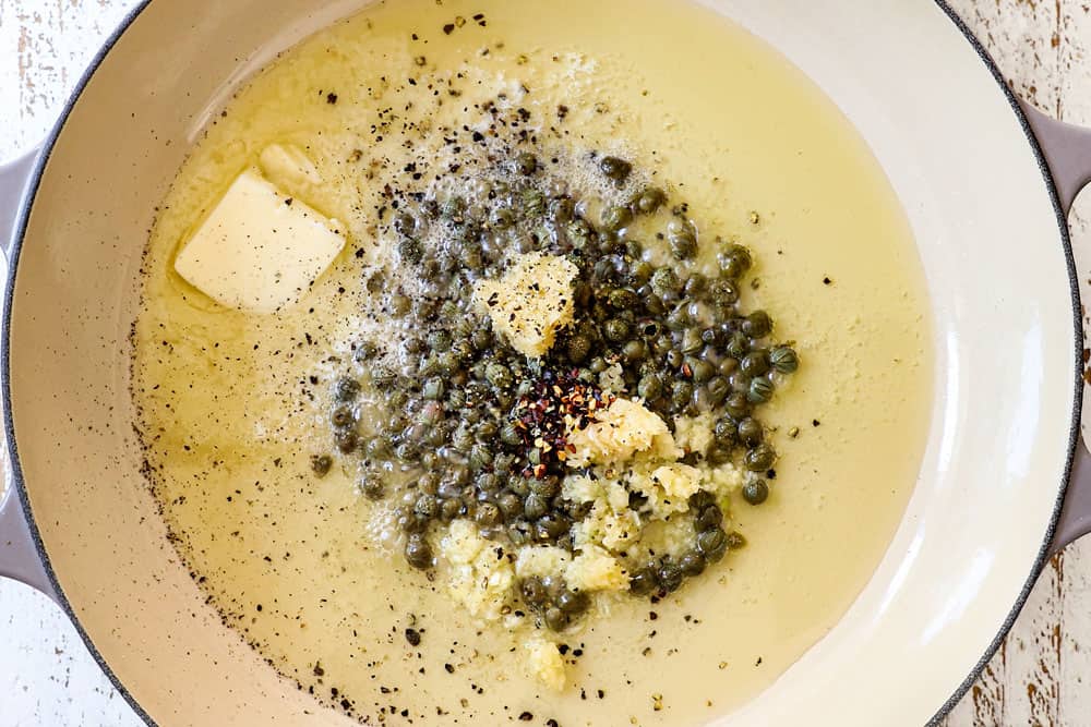 showing how to make lemon pasta (pasta al limone) by sautรฉing garlic, red pepper, ground pepper and capers in lemon and butter