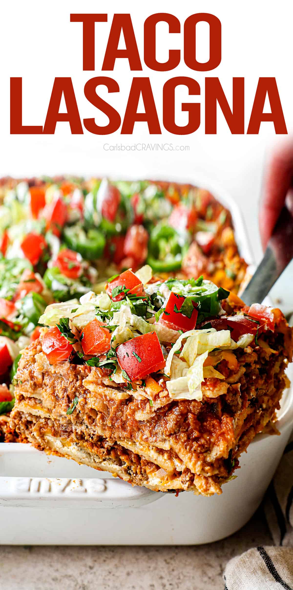 up close of a serving a slice of taco lasagna showing all the layers