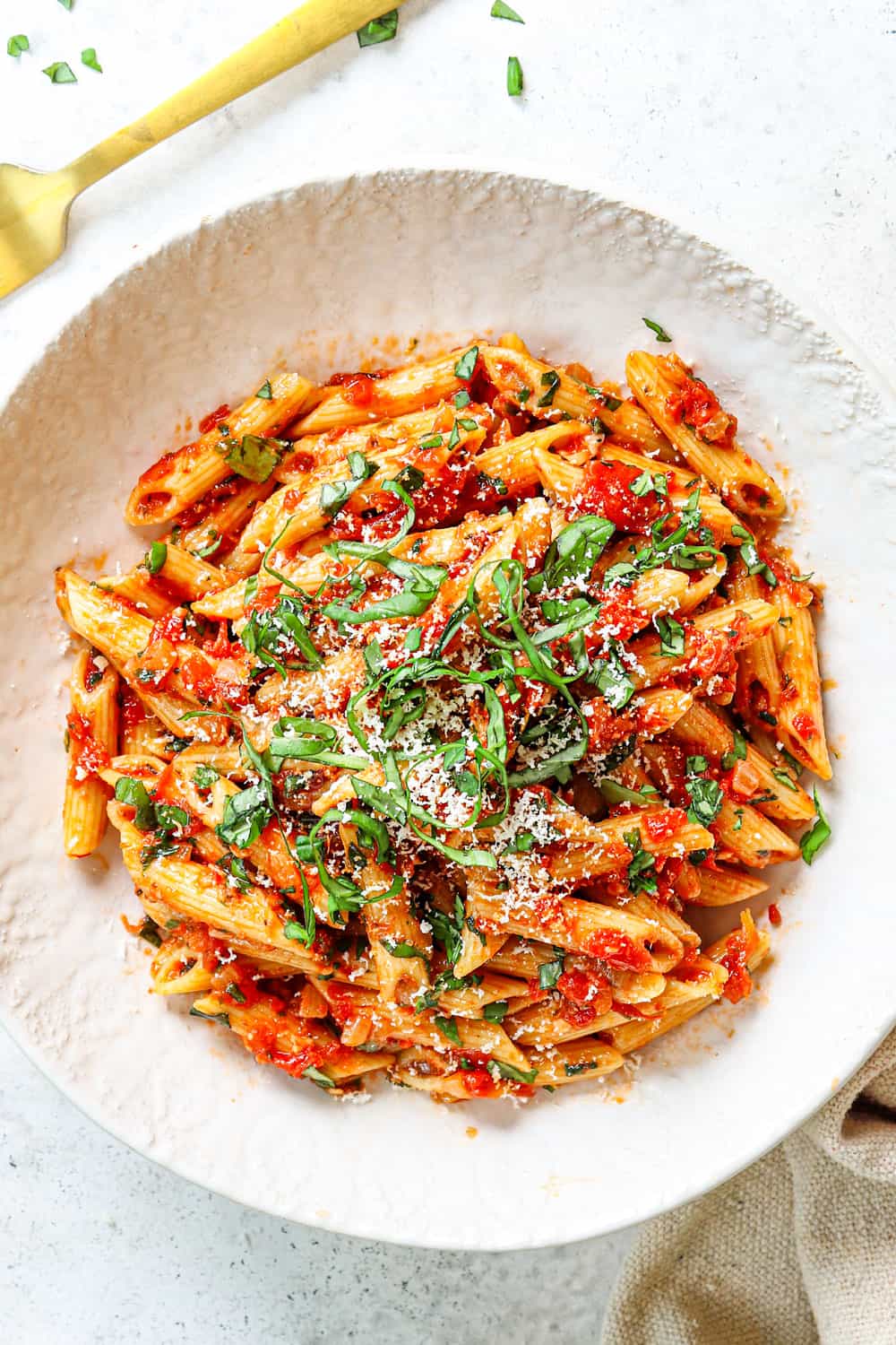 top view of Arrabiata sauce served with penne in a bowl