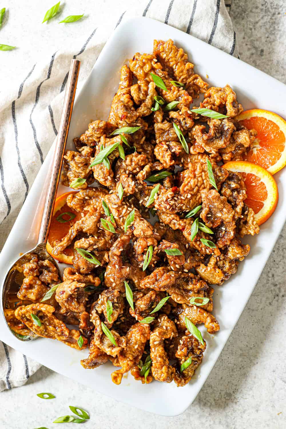 top view of serving orange beef on a platter