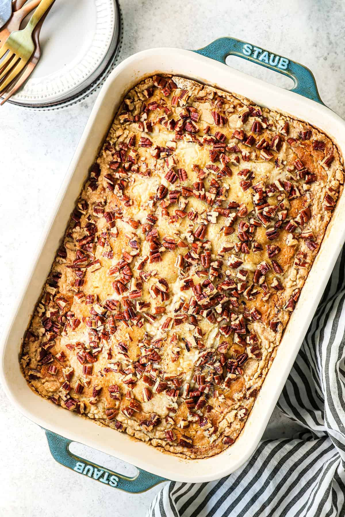 top view of pumpkin dump cake with a pumpkin pie filling and cake topping