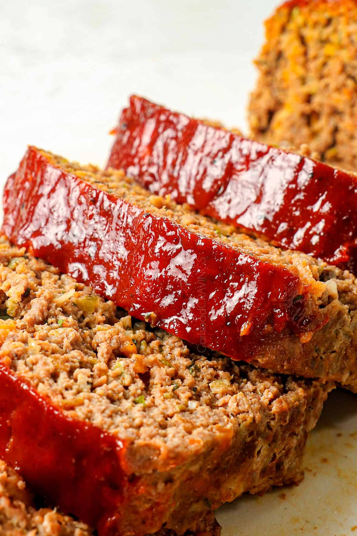 up close of best meatloaf showing how moist and juicy it is