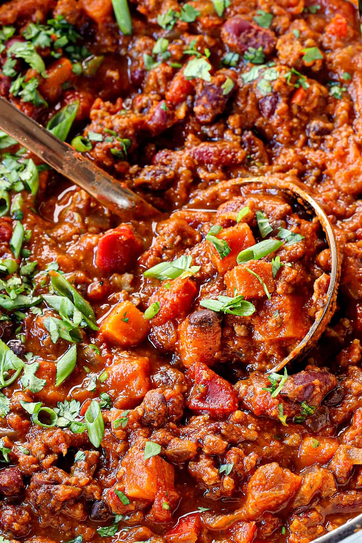up close of pumpkin chili recipe with ground beef, sausage or option of ground turkey