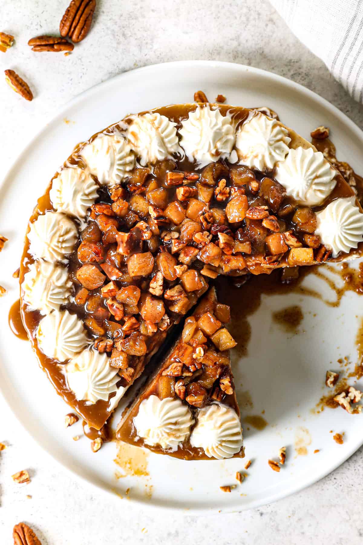 top view of caramel apple cheesecake covered in apple topping