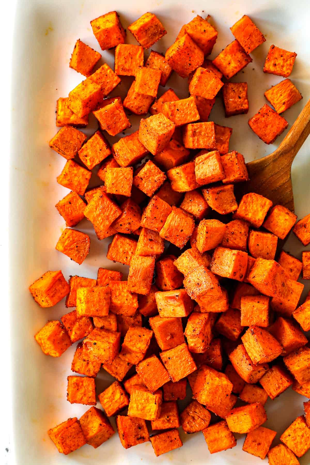 showing how to make sweet potato salad by roasting sweet potatoes