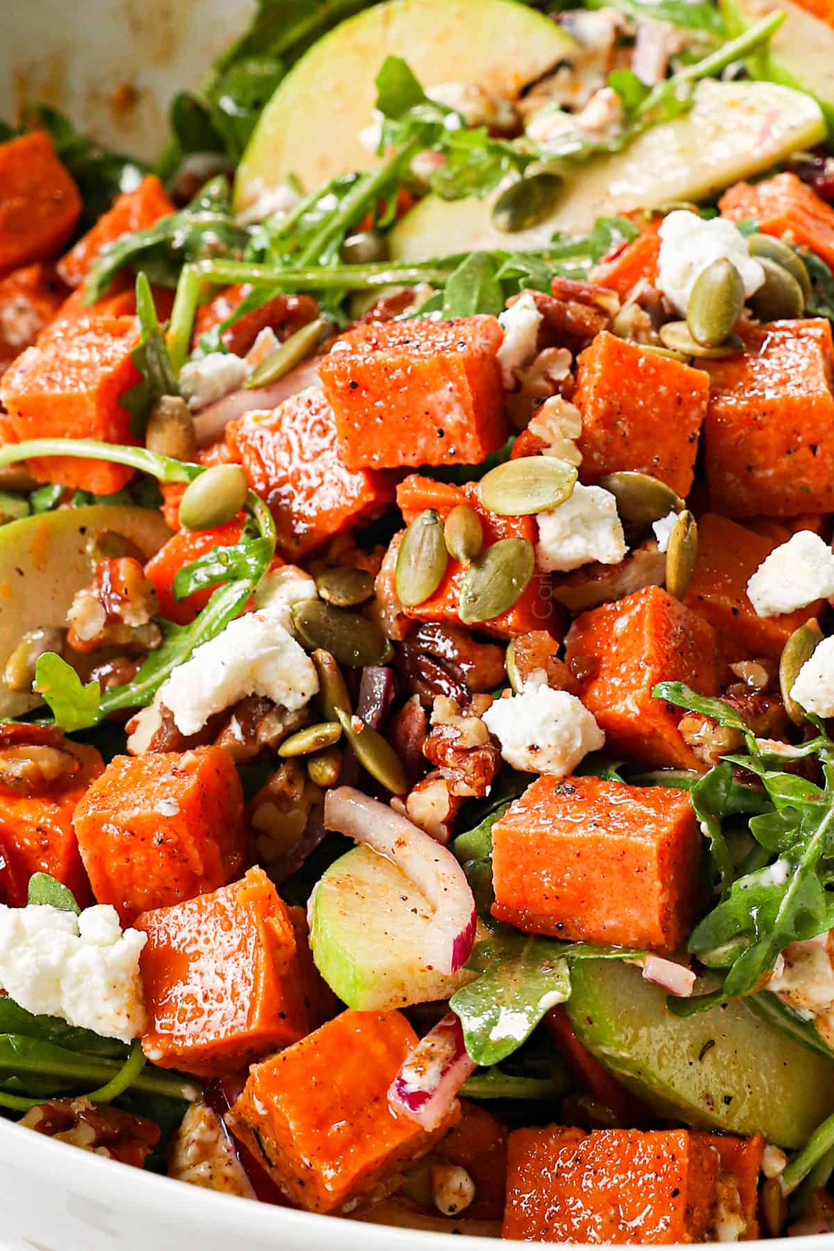 sweet potato salad recipe in a bowl with roasted sweet potatoes