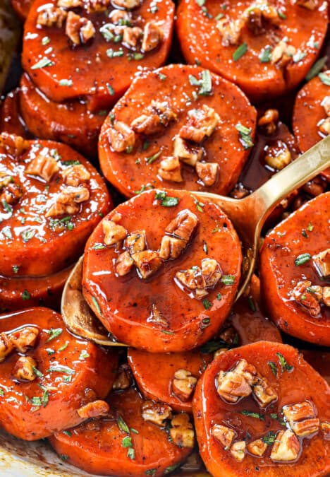 up close of serving candied yams (candied sweet potatoes) showing how tender and caramelize they are