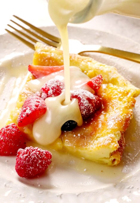 showing how to serve German pancakes by pouring syrup over a slice