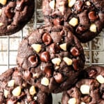 up close top view showing how to make macadamia nut cookies by cooling on a wire rack