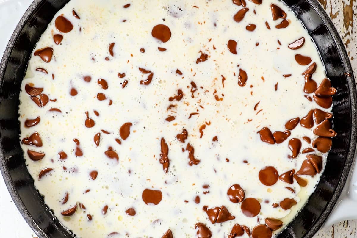 showing how to make s'mores dip by melting chocolate in the oven