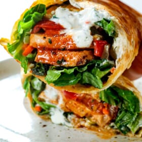 picking up buffalo chicken wraps showing the filling ingredients