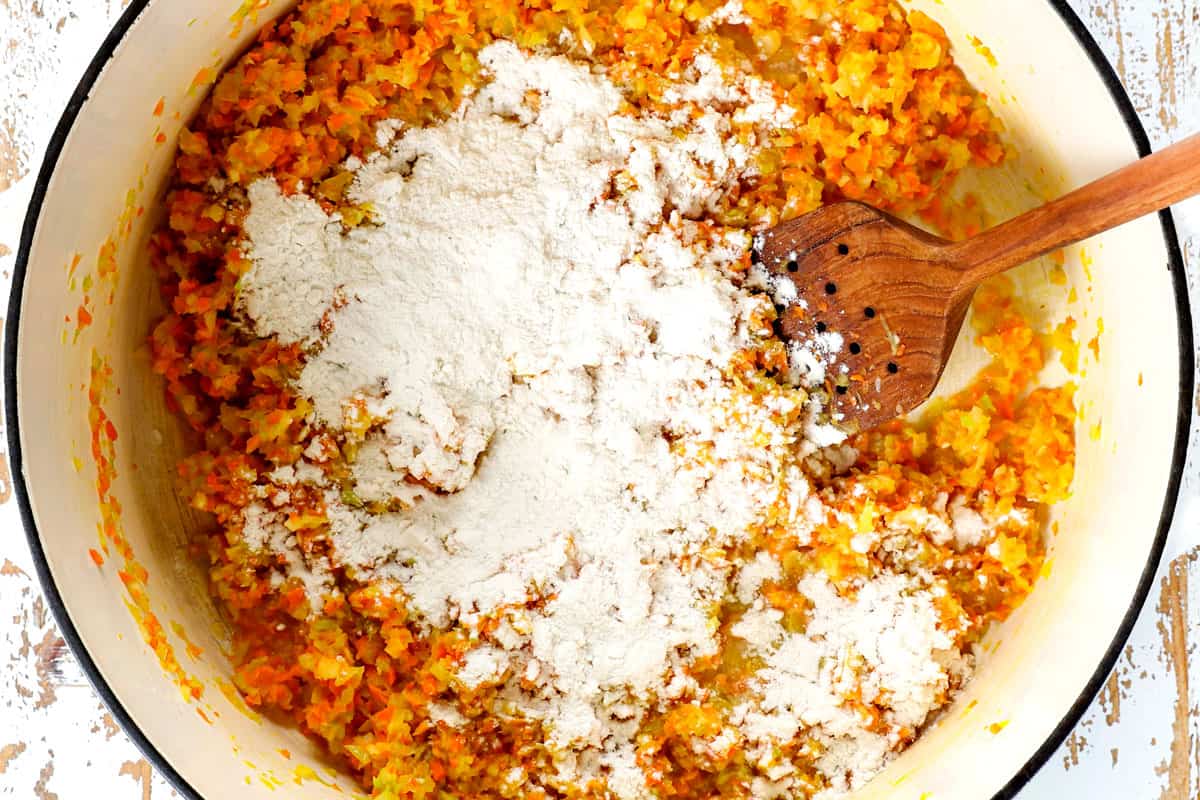 showing how to make creamy tomato tortellini soup recipe by sautรฉing the vegetables, then adding the flour
