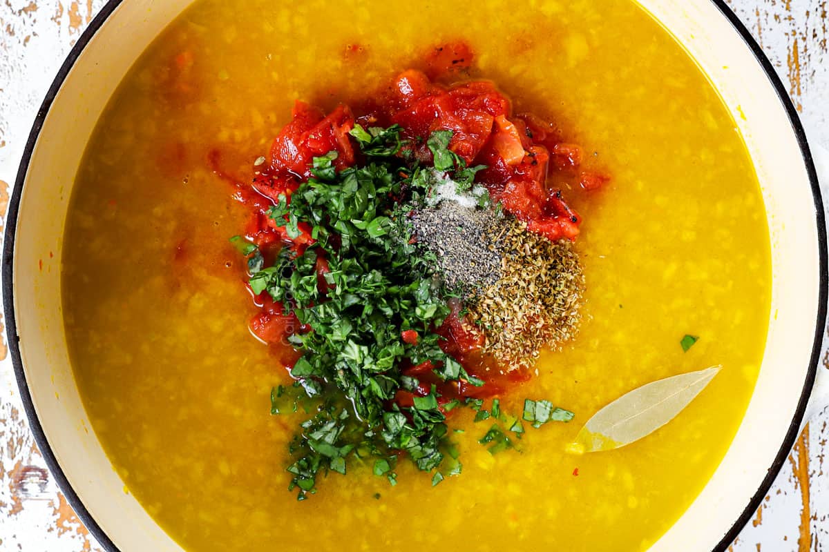 showing how to make creamy tomato tortellini soup recipe by adding diced tomatoes, chicken broth, basil and spices to the soup to simmer