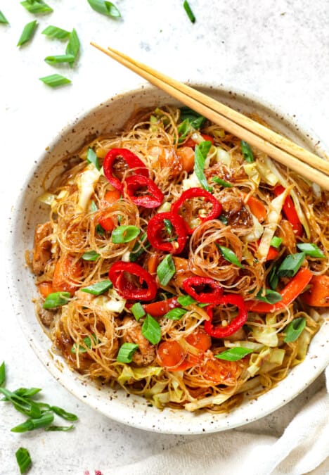 serving pad woon sen in a bowl with chopsticks