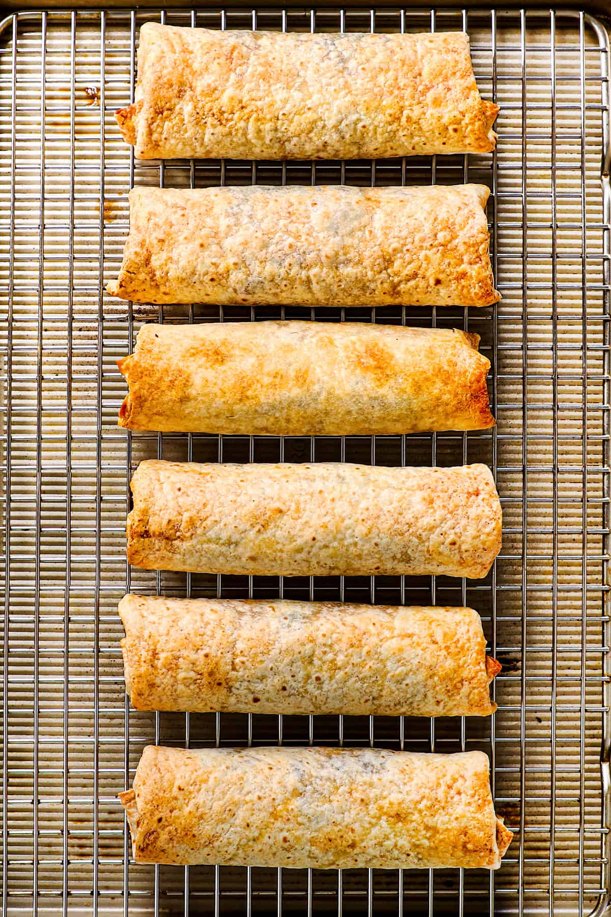 showing how to make chimichangas by baking in the oven or cooking in the air fryer until crispy