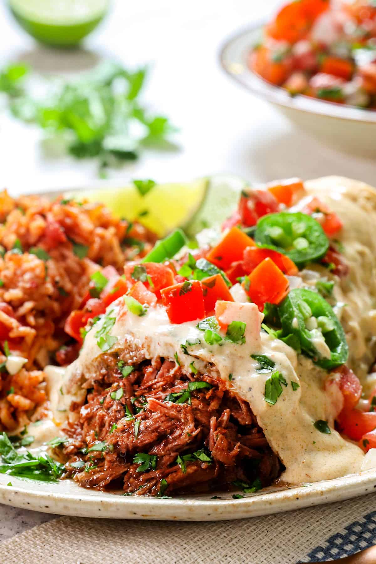 side view of chimichanga recipe showing how juicy the shredded beef is