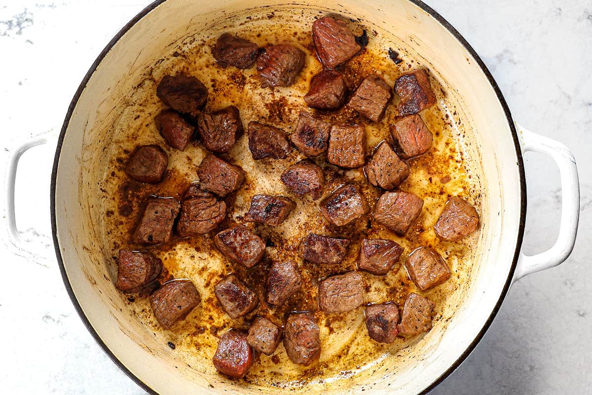 showing how to make Beef Noodle Soup recipe by searing beef until browned