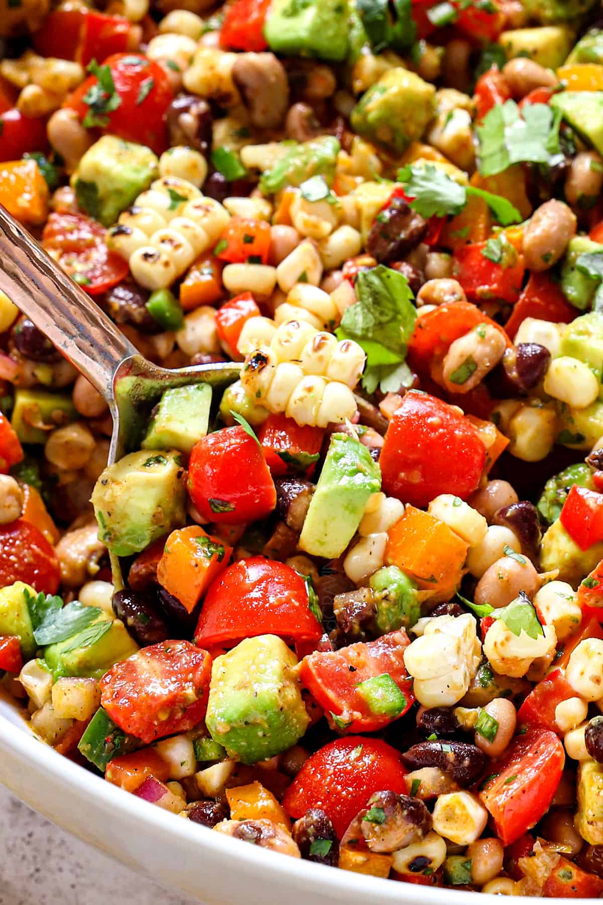 up close of serving cowboy caviar easy with a spoon