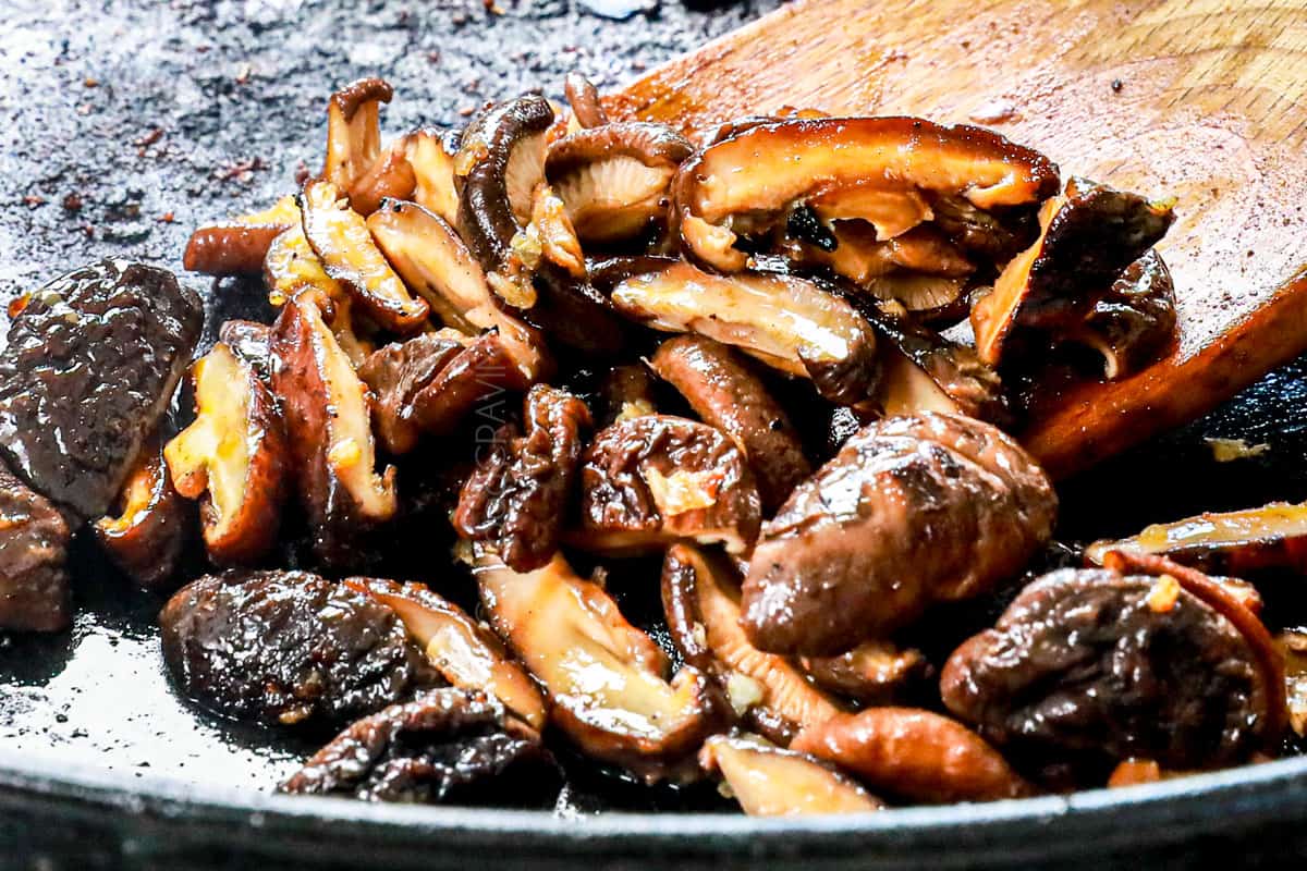 showing how to make bibimbap by sautรฉing mushrooms