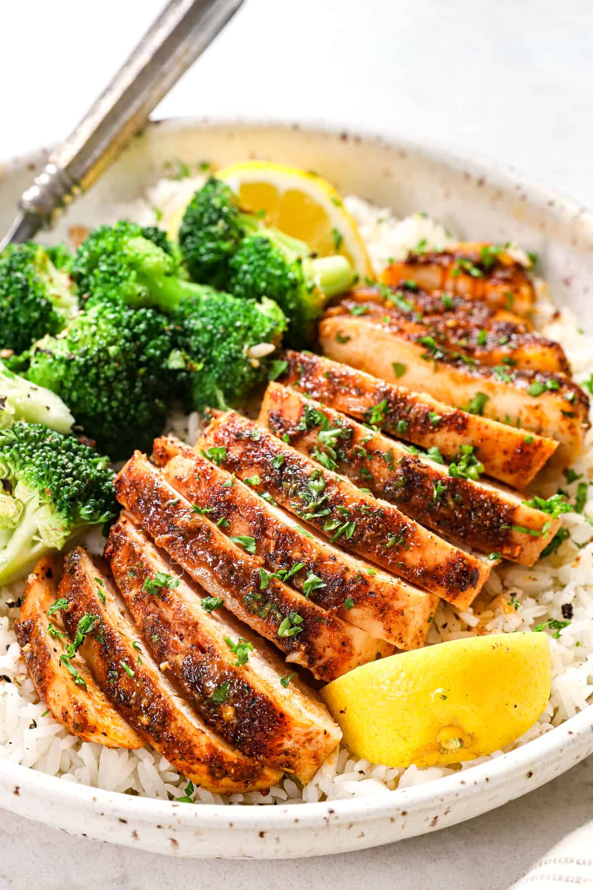 baked chicken breast recipe sliced served with rice