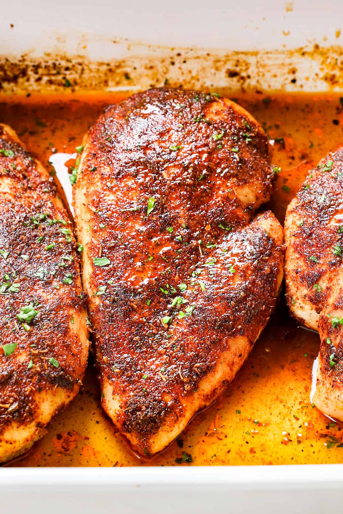 baked chicken breast in oven showing how juicy it is