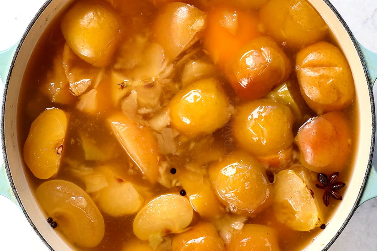 showing how to make apple cider recipe by simmering apples until extremely tender