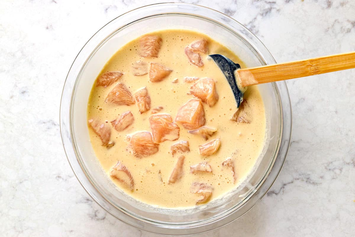 showing how to make Korean fried chicken (yangnyeom) by marinating the chicken in buttermilk