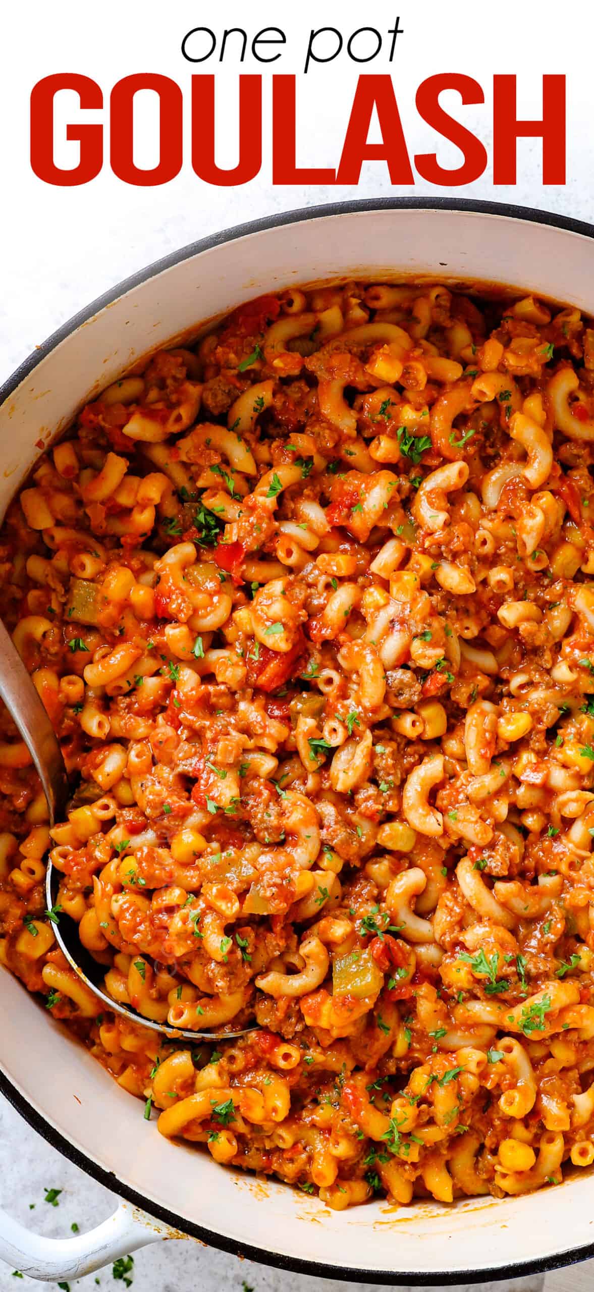 American goulash (American Chop Suey) in a large pot garnished with parsley