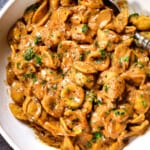 top view of serving French Onion Soup Pasta in a bowl garnished with parsley