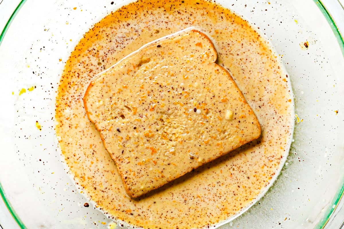 Step 2 showing how to make French Toast by dipping French toast slices in egg batter one slice at a time
