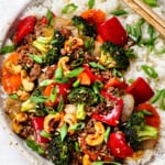 showing what to serve ground turkey stir fry rice by adding to a bowl with rice