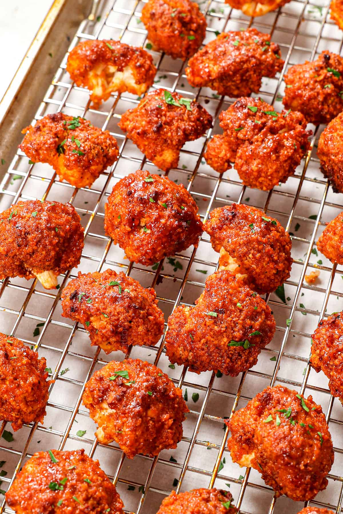 buffalo cauliflower recipe on a baking sheet