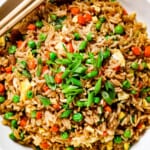 showing how to eat easy fried rice in a bowl with chopsticks