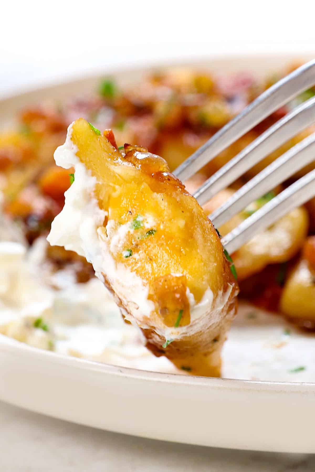 up close or pierogi cut in half showing the pierogi filling