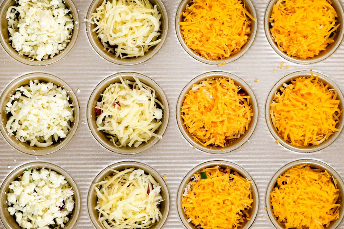 showing how to make egg cups by adding cheese on top of vegetables