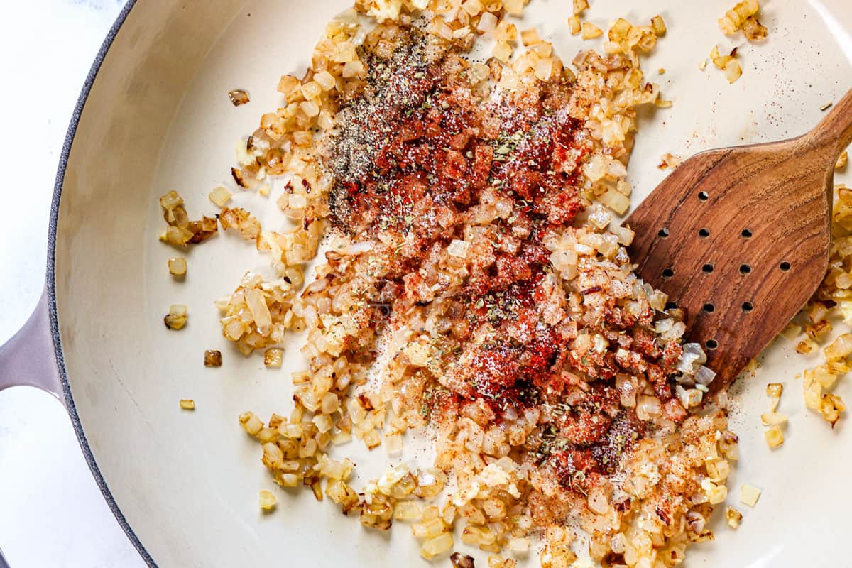 showing how to cook black beans by sautรฉing onions, then adding garlic and spices