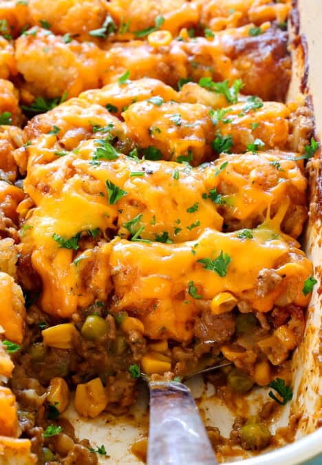 up close of cheesy tater tot casserole showing how cheesy it is