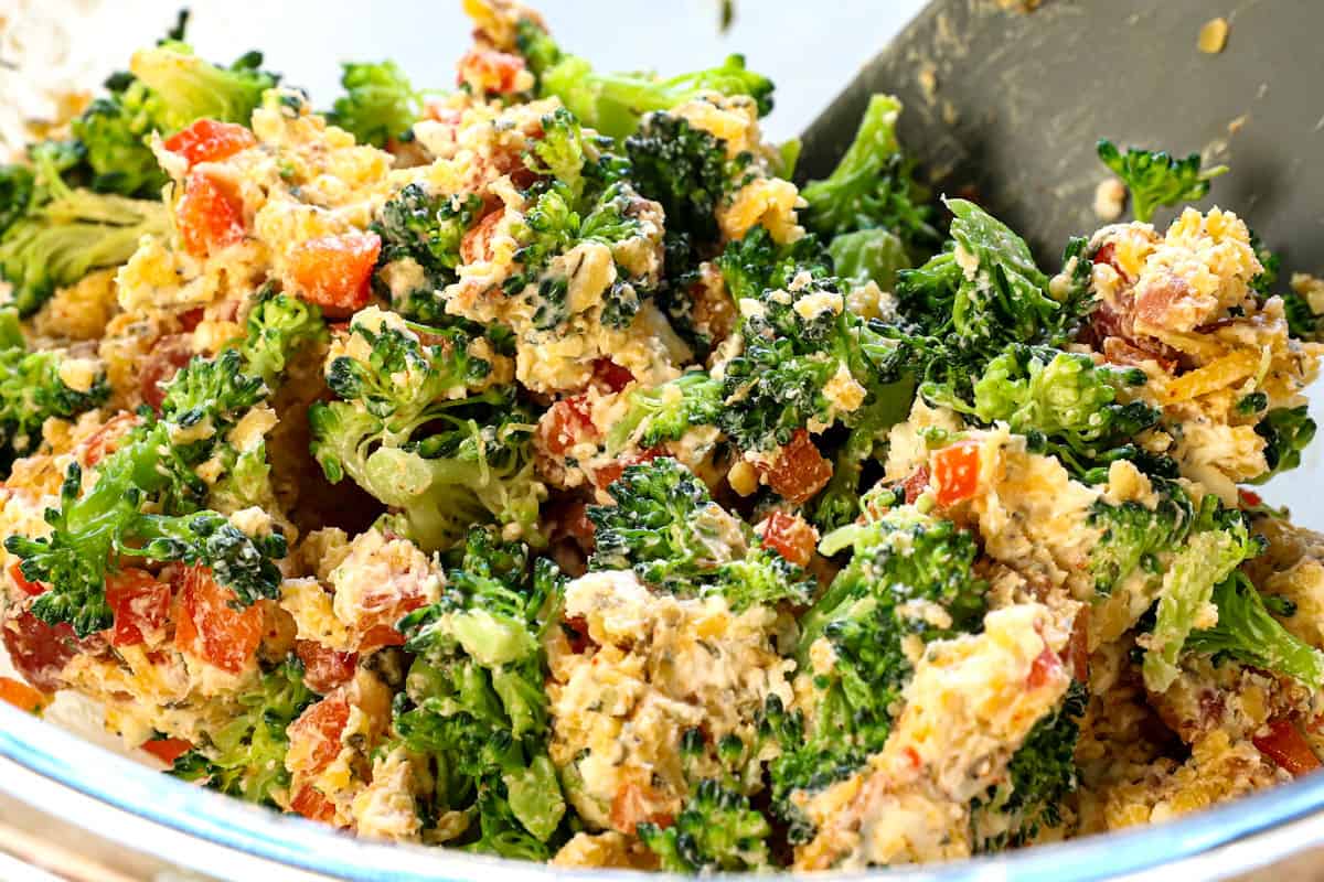 showing how to make stuffed chicken breasts by stirring the filling until well combined